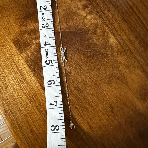 Elegant Gold Bow Bracelet - Picture 3 of 7